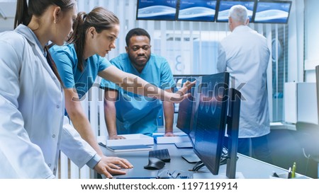 Сток-фото: Colleagues Working With Medical Equipment