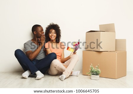 Stock fotó: Couple Choosing Color Scheme Of New Apartment