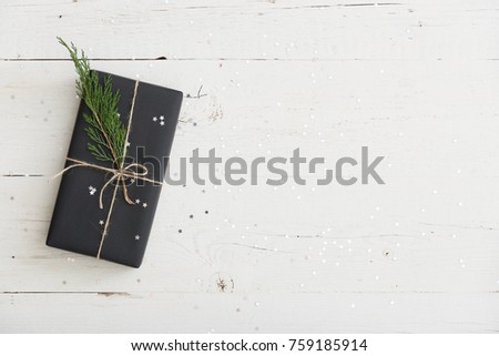 Stockfoto: Christmas Festive Black Gift Boxes With Green Ribbon On Velours Glitte