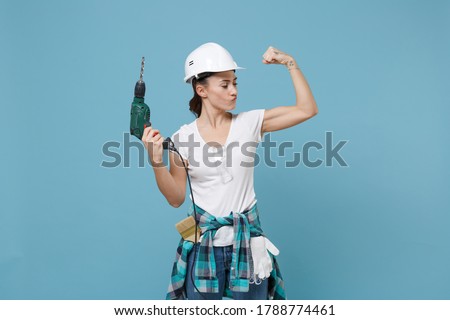 [[stock_photo]]: Woman With A Drill