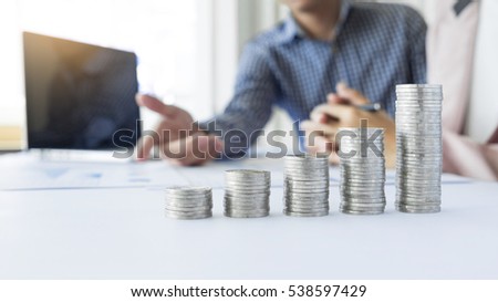 [[stock_photo]]: Business Accounting Man Hands Working Stacking Coin The Calculat