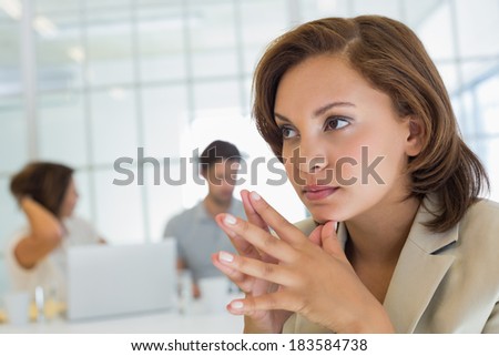 Stock fotó: Side View Of Beautiful Mixed Race Female Executive Looking Thoughtful While Working In Modern Office