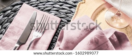 Foto stock: Holiday Table Setting With Pink Napkin And Silver Cutlery Food