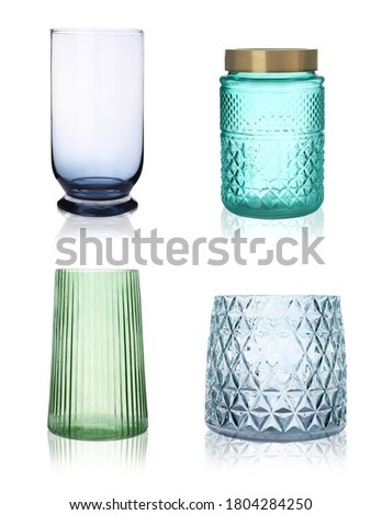 Stock photo: Glass Vases Of Different Shapes And Sizes Are Empty And In One A