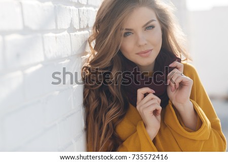Stockfoto: Photo Of Pretty Happy Woman In Knit Hat Posing And Smiling At Camera