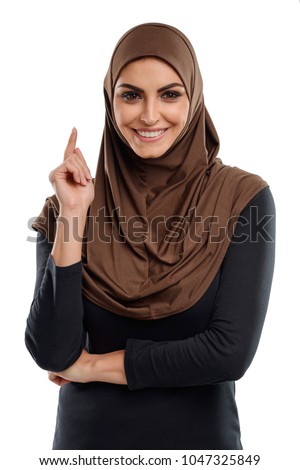 Stock photo: Young Happy Woman In Formal Clothings Points At Her Businessteam