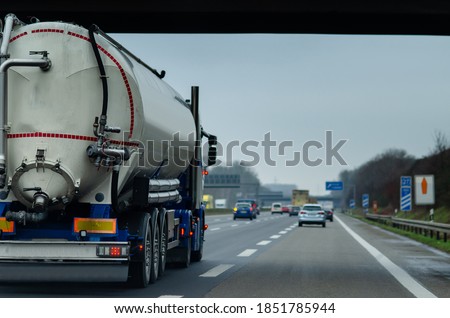 Stock foto: Commercial Trailer Truck In Motion On Freeway On Cloudy Afternoo