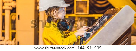Stok fotoğraf: Boy Operator Recording Operation Of Oil And Gas Process At Oil And Rig Plant Offshore Oil And Gas I