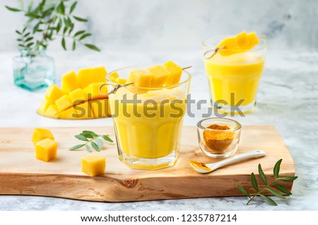 Stock photo: Mango Lassi Yogurt Or Smoothie Healthy Probiotic Indian Popula