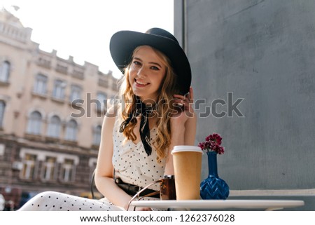 Stock fotó: Beautiful Girl In Blue Beret Looks At Camera Outdoor At Winter