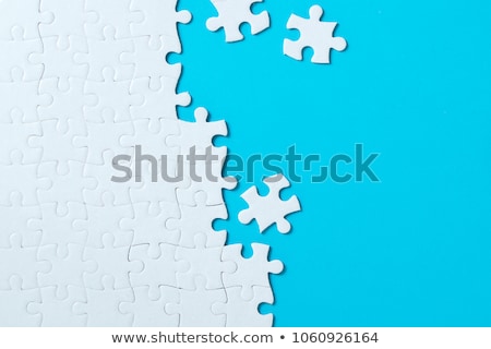 Puzzle albastru Imagine de stoc © Kenishirotie