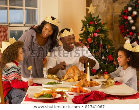 商業照片: Adult African American Family Having Christmas Dinner
