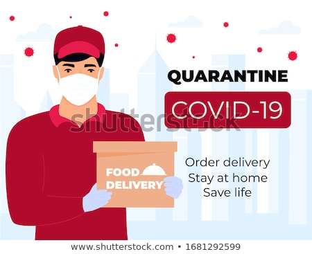 Stock photo: Delivery Boy Holds A Parcel In Cardboard Box