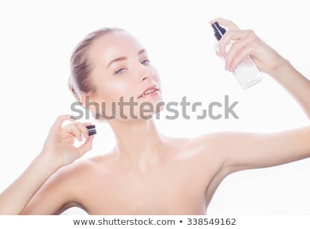 Stock photo: Young Woman With Cleansing Spray Isolated On White
