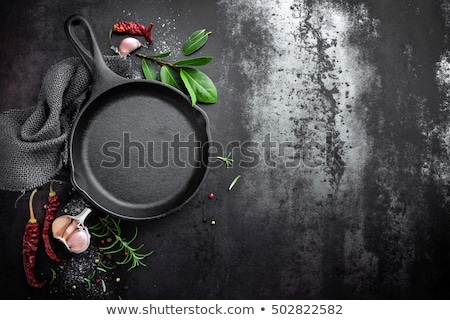 Stock foto: Cast Iron Pan And Spices On Black Metal Culinary Background View From Above