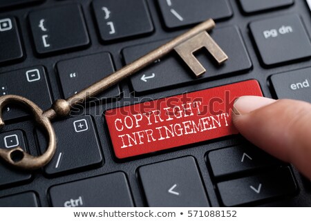 Stock photo: Finger Presses Red Keyboard Button Copyright