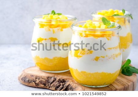 ストックフォト: Jars Of Homemade Vanilla Pudding With Mango