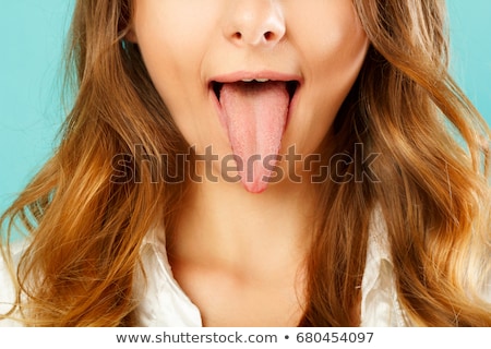 [[stock_photo]]: Female Tongue Sticking Out