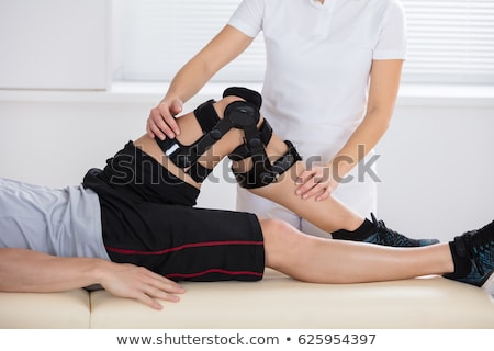 Stock foto: Man Exercising For Knee Injury Recovery