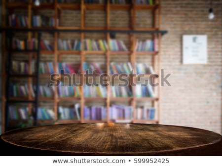 Foto d'archivio: Selected Focus Empty Old Wooden Table And Library Or Bookstore