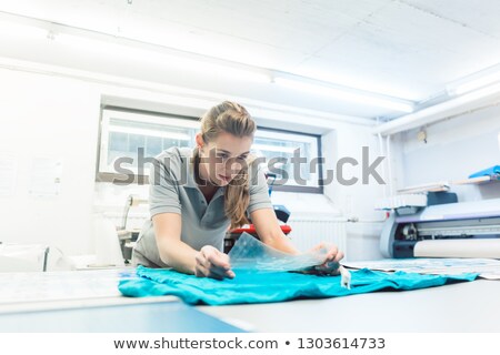 Stock foto: Woman Flock Printing A T Shirt As Promotional Item