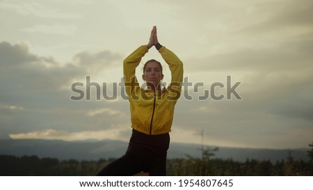 Stock photo: Front View Of Beautiful Caucasian Woman Performing Yoga On Lotus Pose At Beach On Sunny Day