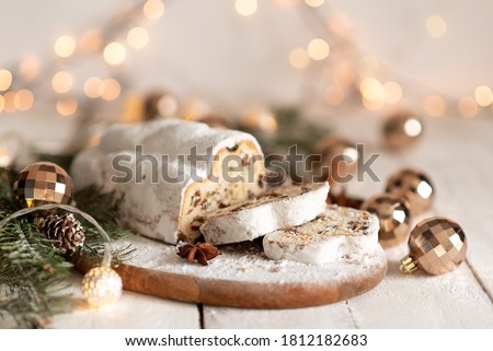 Foto stock: Sliced Stollen With Christmas Decoration A Traditional German Fruit Cake