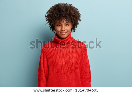 Stock foto: Horizontal Shot Of Happy Positive Afro American Woman Has Fun Keeps Hand On Forehead Giggles Happi