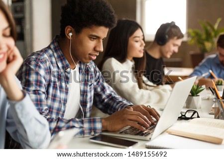 Foto d'archivio: High School Students Young Handsome Man Student Sitting In Clas