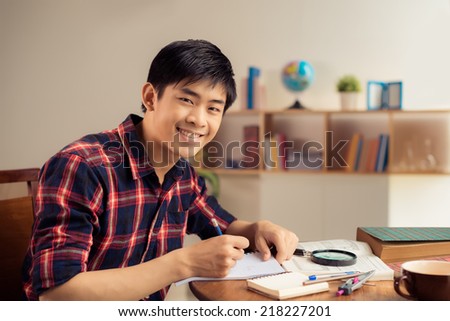 Foto stock: Composite Image Of College Students Doing Homework