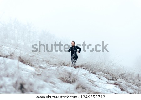 Foto d'archivio: Active Female Joggers Running Outdoors