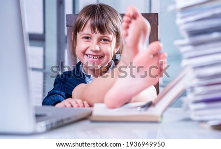 Stock photo: Very Beautiful Business Woman Sits In An Office Chair And Plans Her Business For The Future