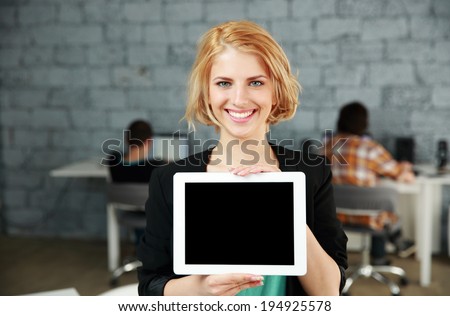ストックフォト: Portrait Of Young Pretty Woman Holding Tablet Computer And Glass