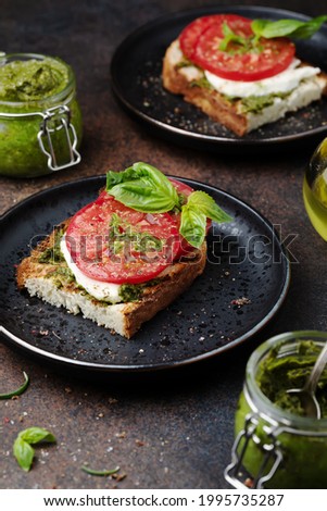 Stock photo: Bruschetta With Tomato Mozzarella And Basil With A Glass Of Win