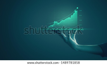 Stock photo: Hand Holding Tablet With Global Reports And Stock Market Change Concept