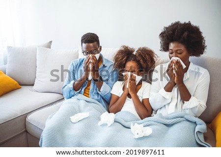 Foto stock: Mother And Daughter Blowing Their Nose With Handkerchief