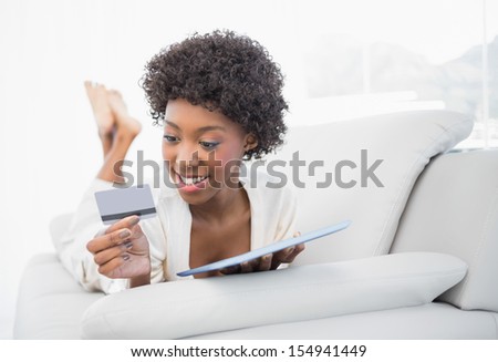 Сток-фото: Happy Brunette Using Her Tablet Computer