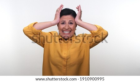 Foto stock: Young Stressed Businesswoman Battling With A Headache During A B