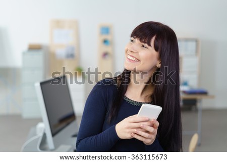 Foto stock: Seated Businesswoman Looks Up To Side While Waiting For Intervie