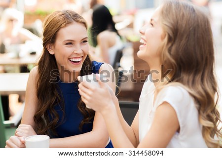 Stock photo: Beautiful Girl Laughing And Smiling In The Cafe Outdoors And Drinking A Cocktail