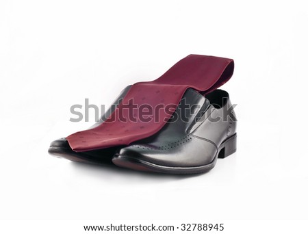 Tie And A Pair Of Mans Classic Leather Shoes Isolated Over Whit Stock foto © Arsgera