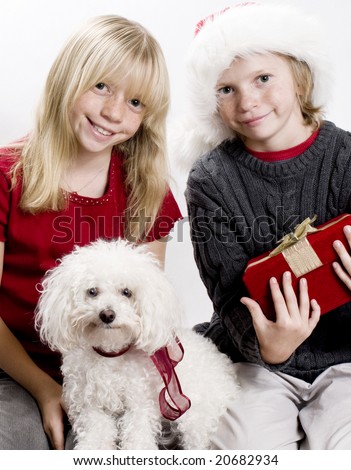 ストックフォト: Beautiful Blond Girl Holding A Christmas Tree Isolated On White