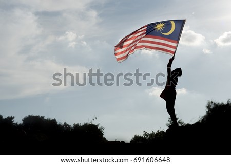 Stock photo: Boy Travels In Malaysia With Malaysia Flag Celebrating The Malay