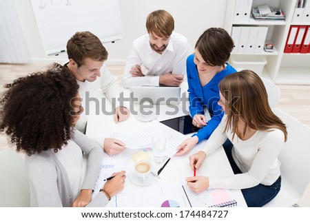 Stock foto: High Angle View Of Happy Multi Ethnic Business Executives Looking Up At Camera In Modern Office