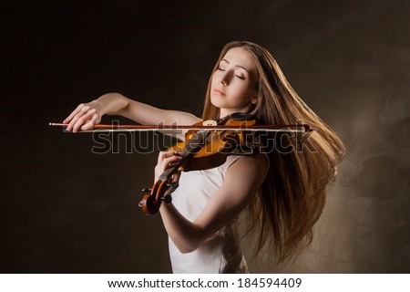 Young Woman Plays The Viola Zdjęcia stock © Julenochek