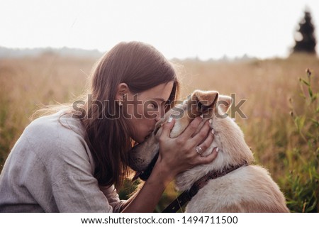 Stock photo: Happy Woman Enjoying Nature With Her Dog