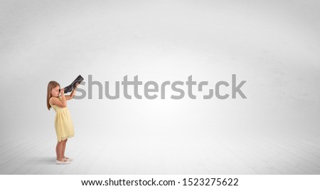 Zdjęcia stock: Kid Looking Through Spyglass To An Empty Space