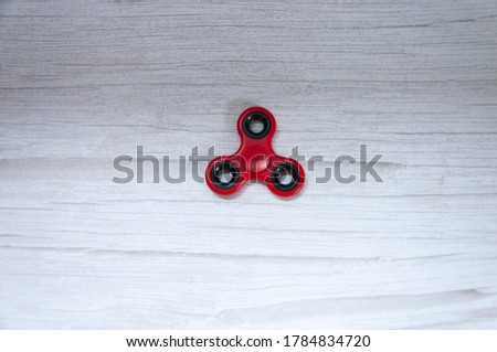Stock fotó: Colored Fidget Spinners Stress Relieving Toy On Wooden Background