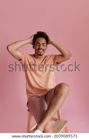 Stock fotó: Portrait Of Young Indian Man Closed Eyes Over Dark