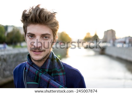 Portrait Of A Young Man With Hair On The Wind In Autumnwinter Clothes Foto stock © Zurijeta